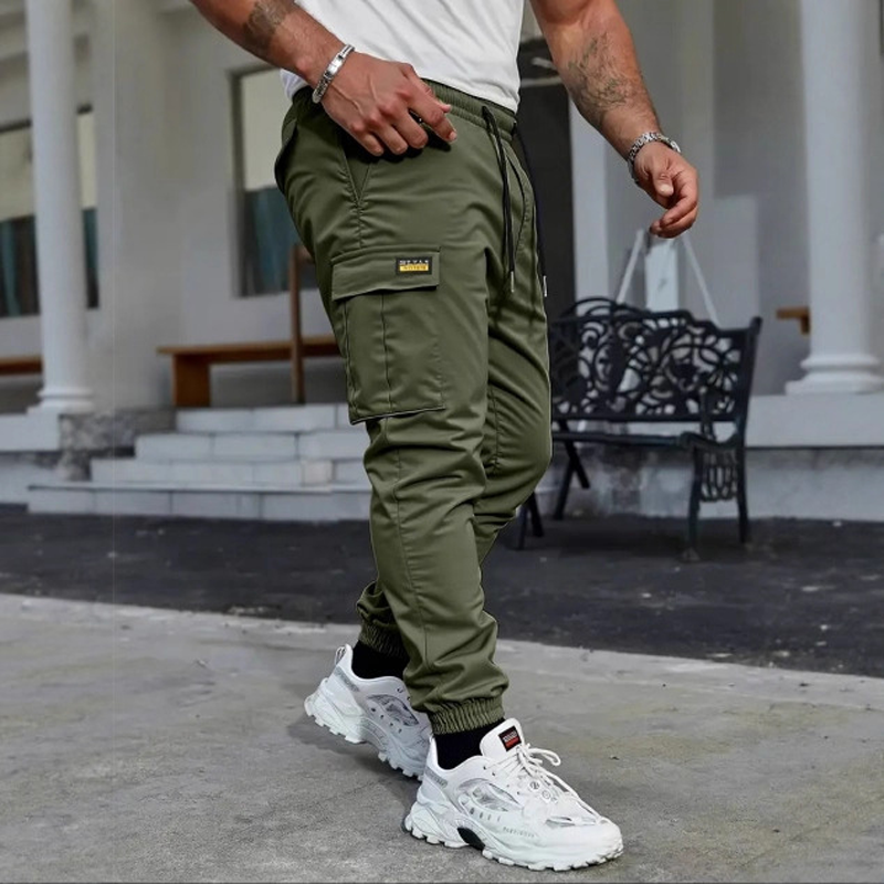 👖50 % DE RÉDUCTION🏃 Pantalon de survêtement de travail | Cordon de serrage à la taille · Polyester résistant · Jambes fuselées · Plusieurs poches